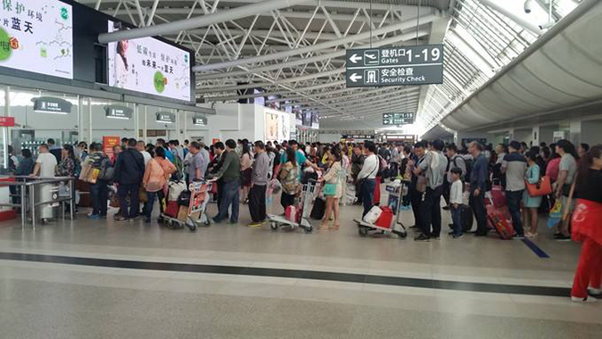 科技成果亮相春運安檢現(xiàn)場,人臉識別與掃碼齊上陣